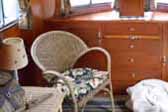Beautifully furnished interior in 1938 Kozy Coach Trailer living room